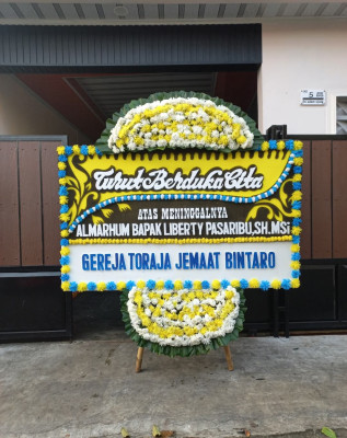 Papan Bunga Duka di Langkai